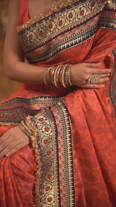 Enchanting Orange Zari Saree